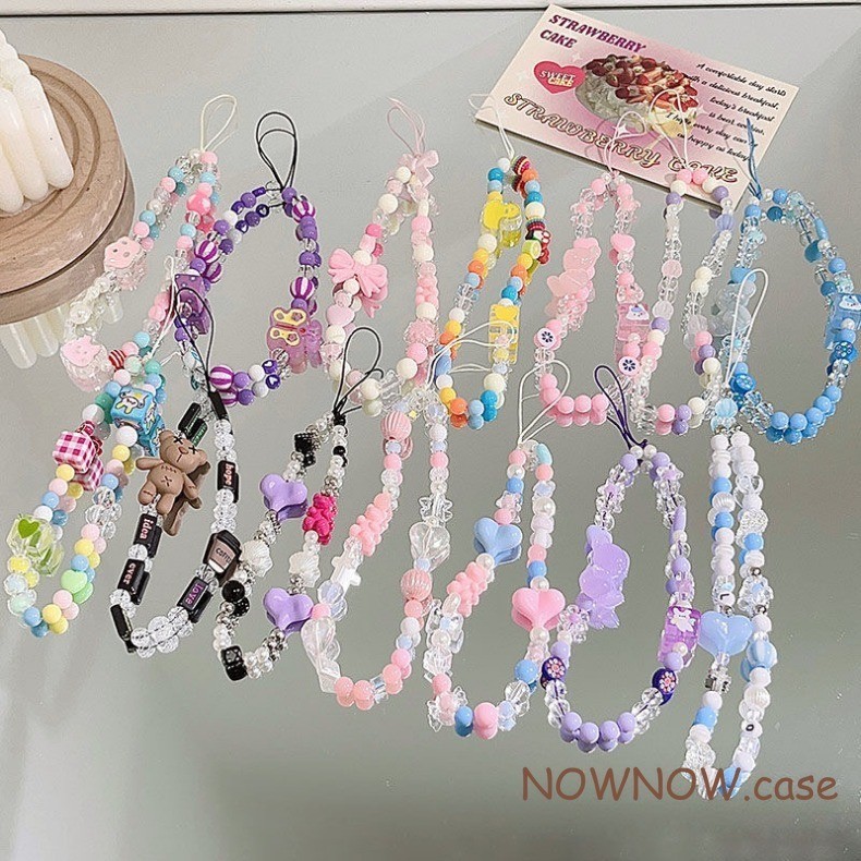เหมาะสําหรับเคสโทรศัพท์ทุกรุ่นหูฟังบลูทูธ ซีซีดี สร้อยข้อมือการ์ตูนน่ารักสีชมพูสาวมุกลูกปัด เชือกรูด