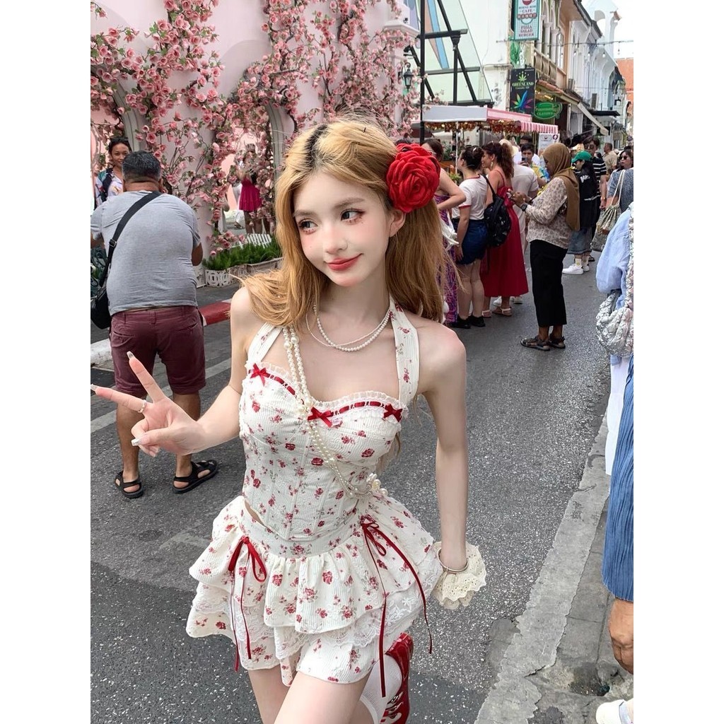 ชุดเซ็ต 2 ชิ้น เสื้อลายดอกประดับโบว์ + กระโปรงเเต่งระบาย สไตล์เวียดนาม สำหรับสาวหวาน สาวเซ็กซี่
