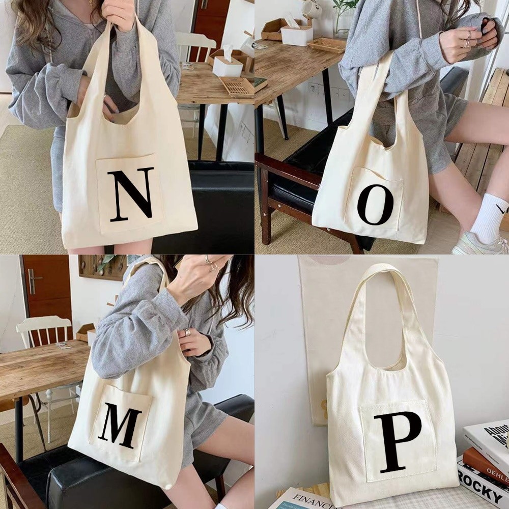 ตัวอักษรสีดำผ้าใบเสื้อกั๊กไหล่กระเป๋านักช้อปทุกวัน Tote Bag กระเป๋าช้อปปิ้งแบบพกพาแบบใช้ซ้ำได้