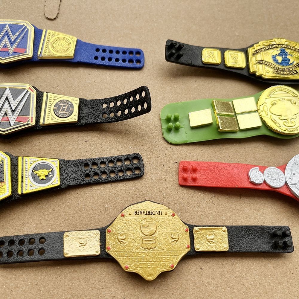 ขายร้อน Mattel wwe Gold Belt นักมวยปล้ํา Wrestler ตุ๊กตาอุปกรณ์ต่อพ่วง Universal Champion Belt
