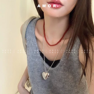 สร้อยคอยาวลูกปัดข้าวหัวใจโลหะสไตล์บล็อกเกอร์เกาหลีสําหรับผู้หญิงหรูหราเบาๆเฉพาะกลุ่มสร้อยคอชั้นเรียบง่าย