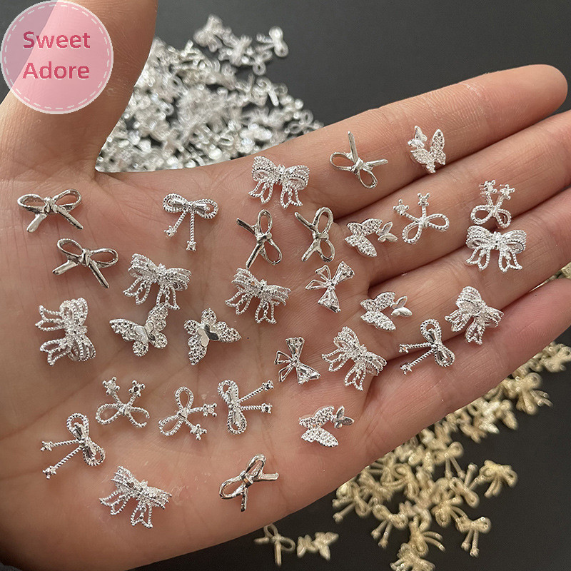 Sweetadore ทองเงินดอกไม้อุปกรณ์ทําเล็บ Rhinestones เล็บเครื่องประดับโบว์ตกแต่งเล็บ 3D เจาะ TH