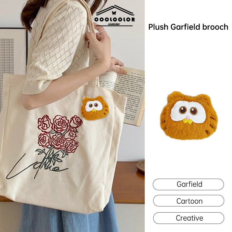 ในไทย เข็มกลัดGarfieldแมวน้อยน่ารักลายการ์ตูนผ้ากํามะหยี่ขนนิ่มส้มสําหรับตกแต่งกระเป๋าเป้สะพายหลังและนักเรียนDIY