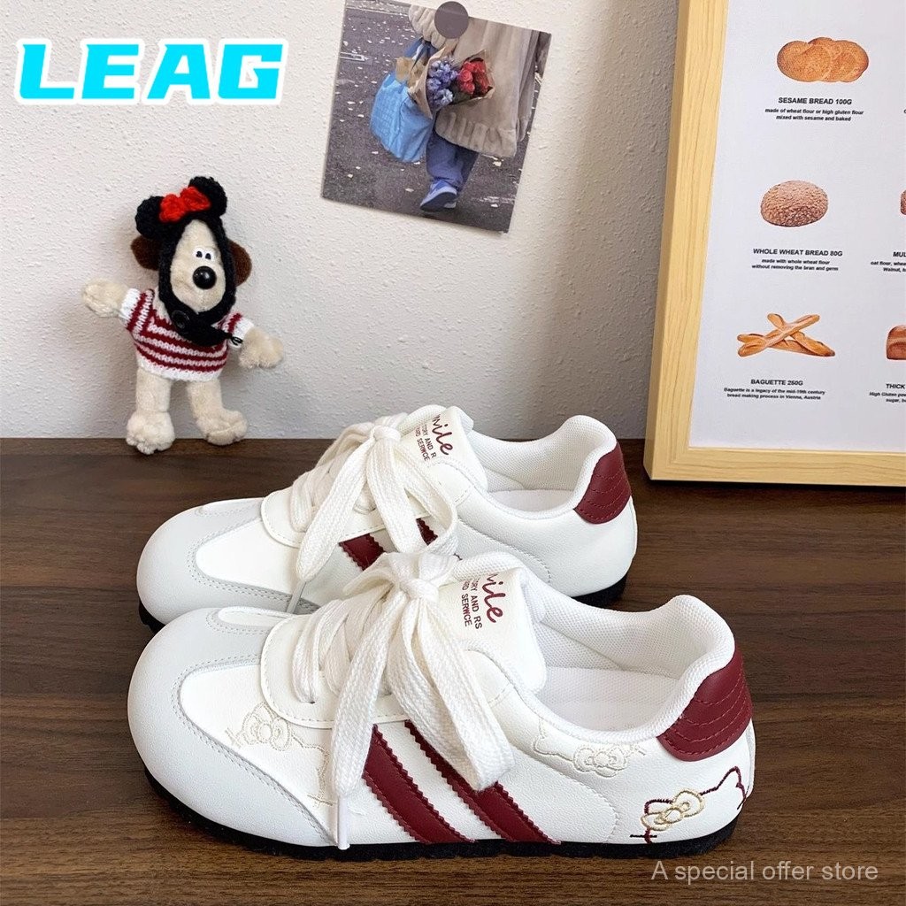 รองเท้าฝึกซ้อมเยอรมันปักลายแมว KT น่ารัก LEAG Lan Jue รองเท้าผู้หญิงแบบสบาย