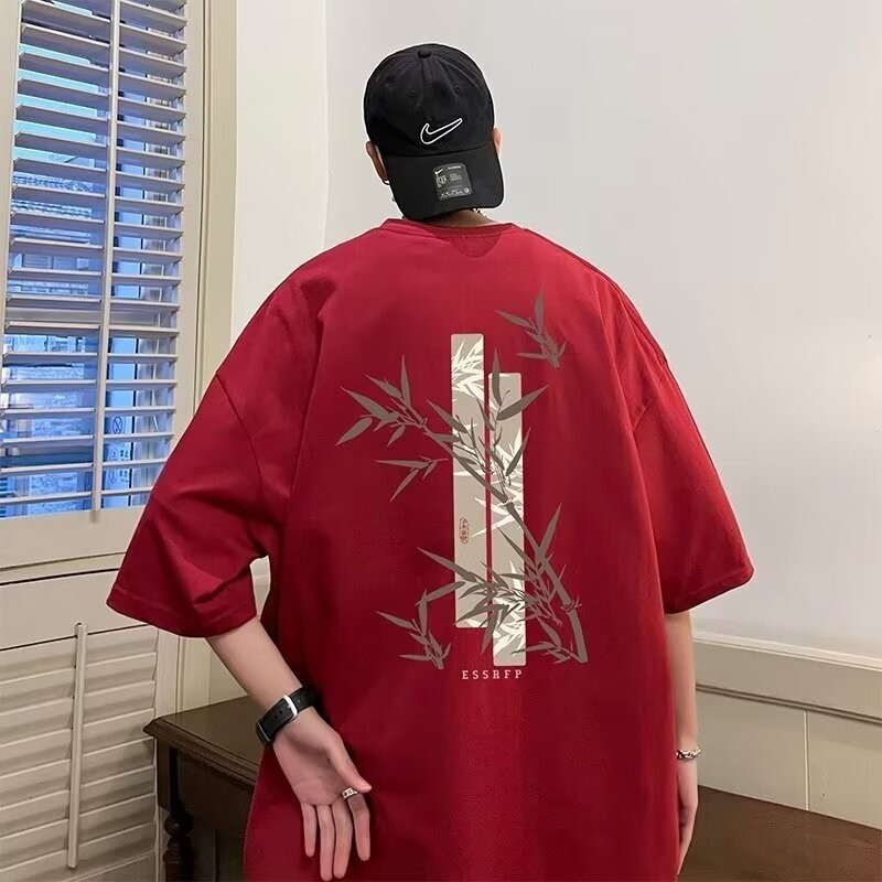 【M-8XL】เสื้อยืดแขนสั้น โอเวอร์ไซซ์ พิมพ์ลายใบไผ่ สไตล์จีน ทรงหลวม ใส่สบาย สําหรับผู้ชาย และผู้หญิง