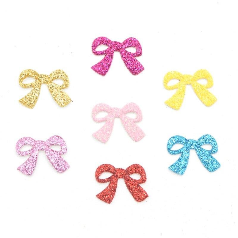 100 ชิ้น 2 ซม.Glitter หนังแพทช์ Bowknot Applique สําหรับ DIY หัตถกรรมเสื้อผ้าคลิปผม Tie Dotted อุปกรณ์ตกแต่ง