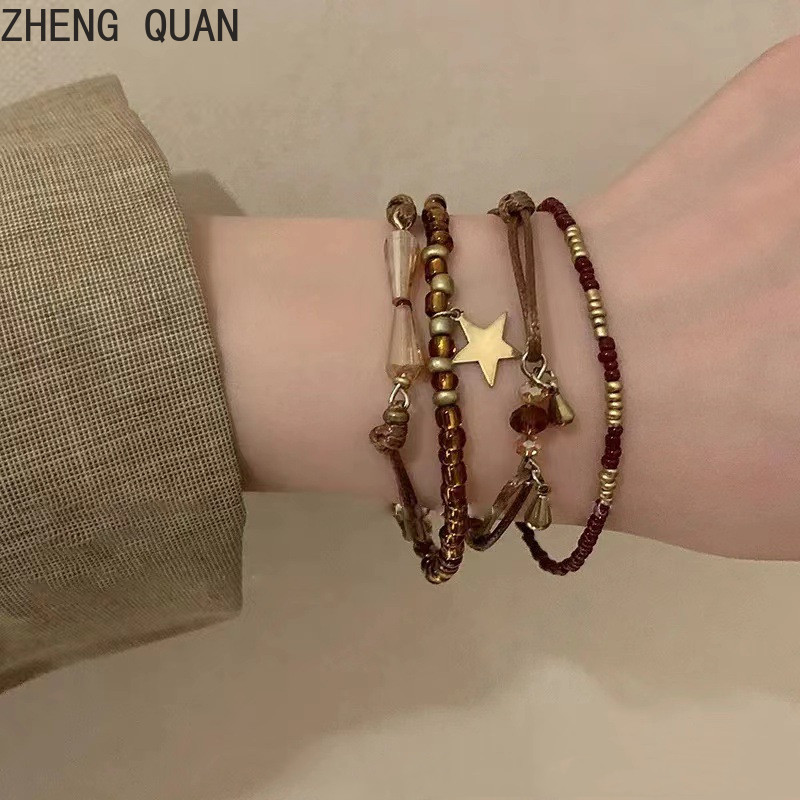4 ชิ้น/เซ็ตกาแฟสไตล์ชาติพันธุ์ Multi-Layered Star สร้อยข้อมือ Stacked สร้อยข้อมือลูกปัดสําหรับผู้หญิงแฟชั่นเครื่องประดับของขวัญวันหยุดอุปกรณ์เสริม Curry สี