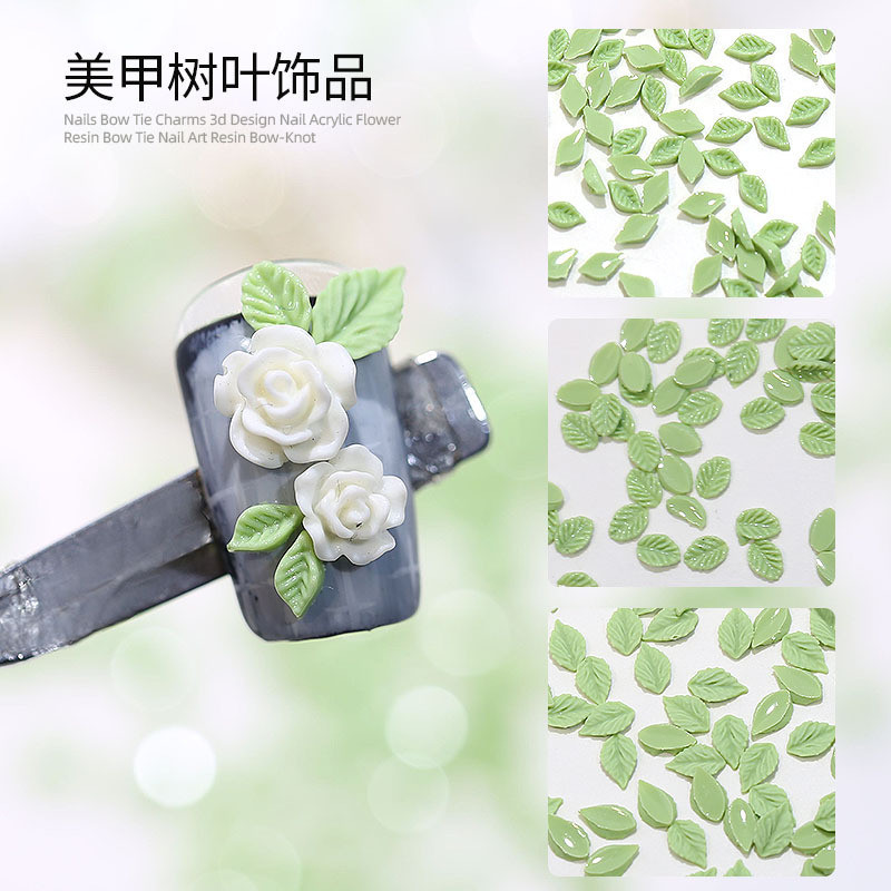 ร้อนขาย ผู้มีอิทธิพล ส่องสว่างใบอุปกรณ์ทําเล็บจําลองมินิสีเขียวใบเรซิ่น ทําเอง เครื่องประดับเล็บขายส่ง