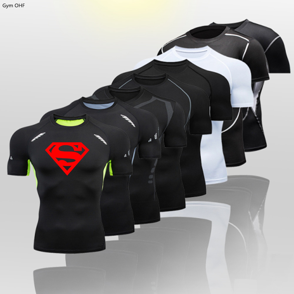เสื้อยืด เสื้อกีฬา แบบรัดรูป พิมพ์ลาย Superman แบบแห้งเร็ว สําหรับผู้ชาย ใส่ไปยิม