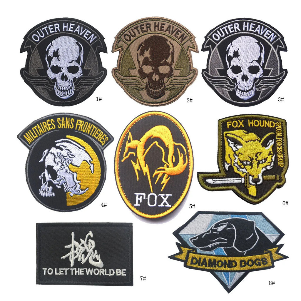 100% เย็บปักถักร้อย Peace Walker Insignia เกียร์โลหะผสม MGS OUTER HEAVEN ปัก Armband ป้ายกลับกาว Badge Epaulette Patch