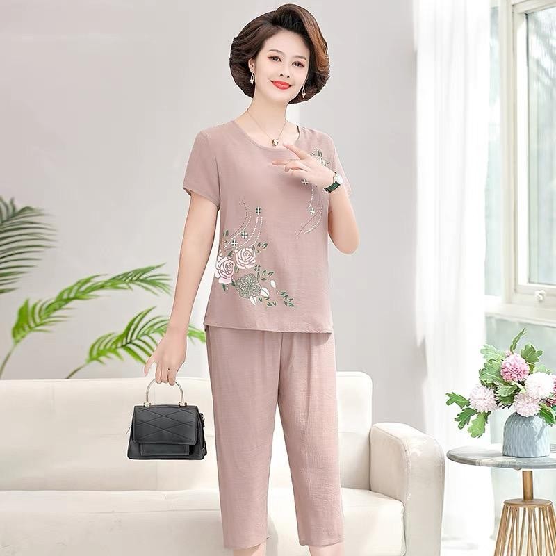 เสื้อยืดคอกลมแขนสั้นลายดอกไม้ผู้หญิงชุดลําลอง + กางเกงขายาวสองชิ้นขากว้างตรงแฟชั่นใหม่ชุดหลวมทุกการแข่งขัน - รูปที่ 2