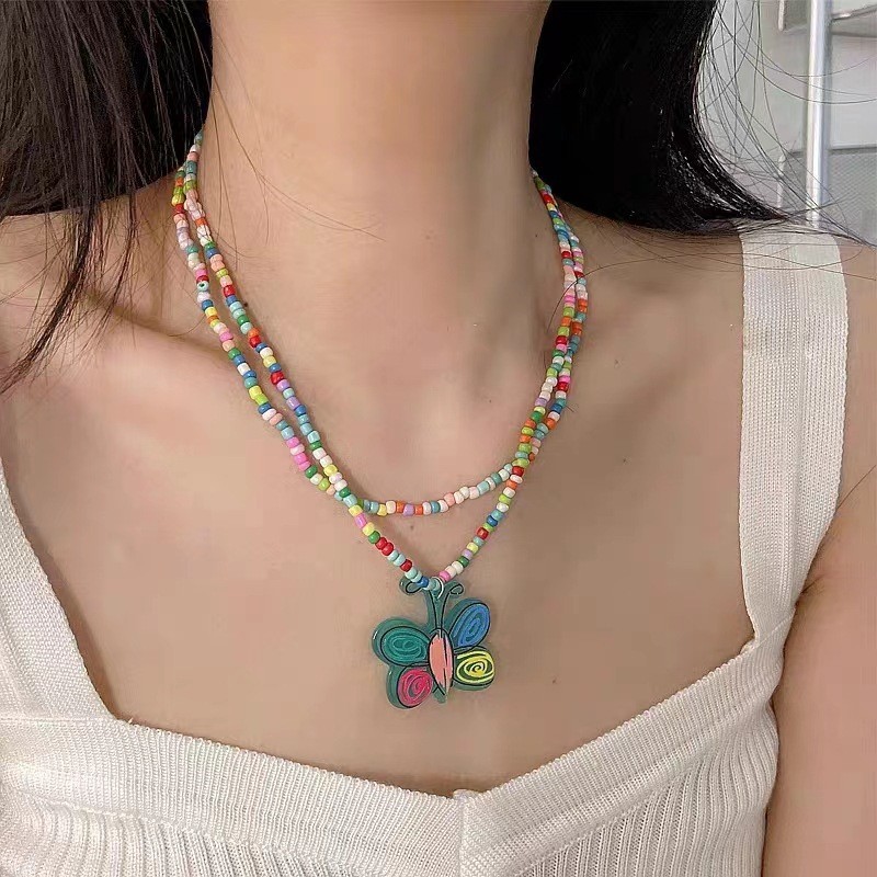 2024 Ins สไตล์ใหม่สีลูกปัดสร้อยคอสองชั้นแฟชั่นเกาหลีสร้อยคอผีเสื้อสาว Clavicle Chain