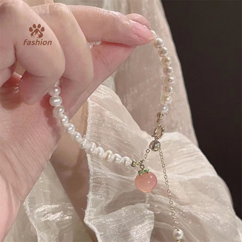 [แฟชั่น] แฟชั่นเกาหลีพีชจี้สร้อยข้อมือสําหรับสุภาพสตรีหรูหราพิสดารมุกโซ่สร้อยข้อมือเครื่องประดับพรรคของขวัญ {ไทย}