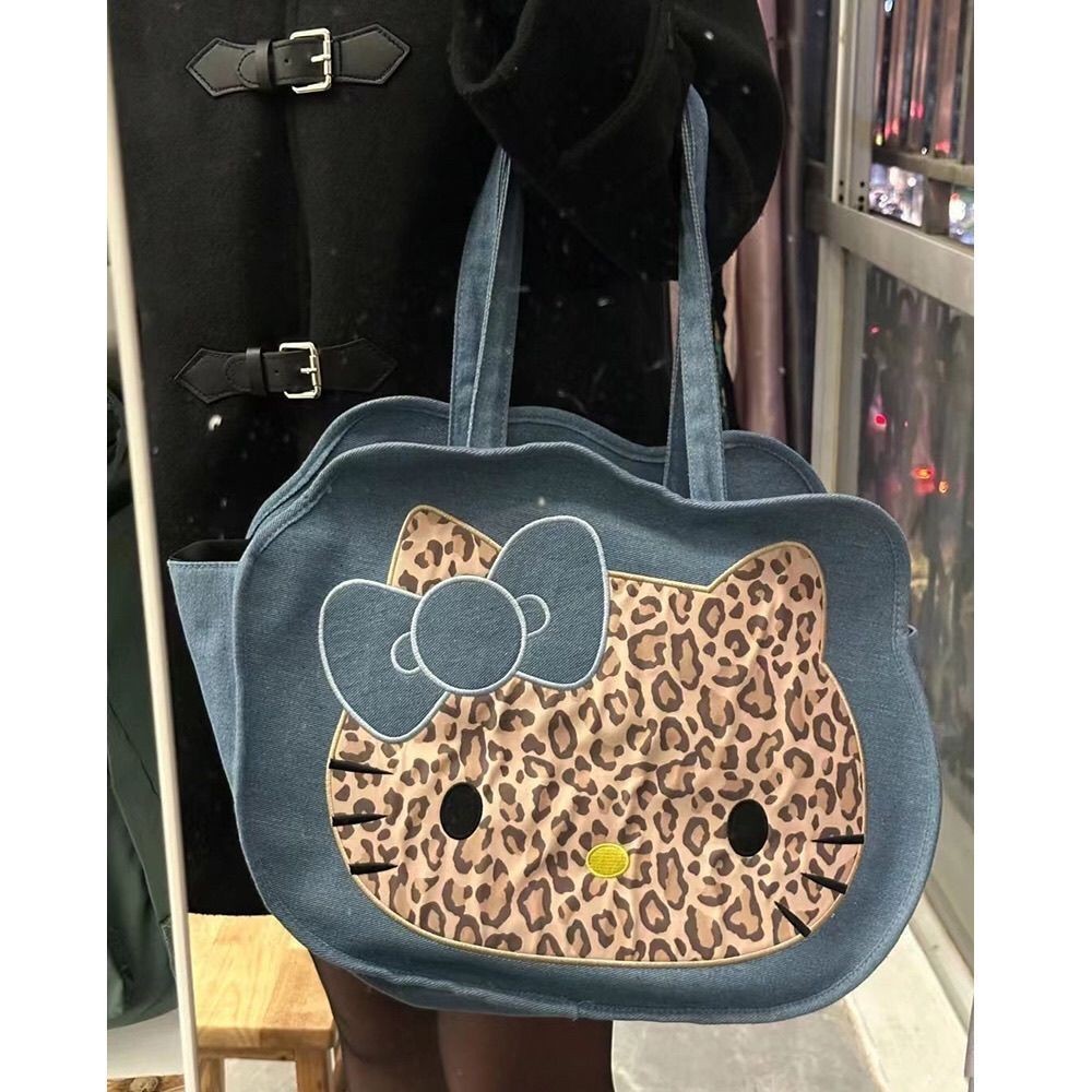 เสือดาวพิมพ ์ Kitty กระเป ๋ าสะพายนักเรียนหญิงเกาหลีผ ้ าใบ Tote กระเป ๋ าอเนกประสงค ์ ความจุขนาดใหญ ่ กระเป ๋ าถือ