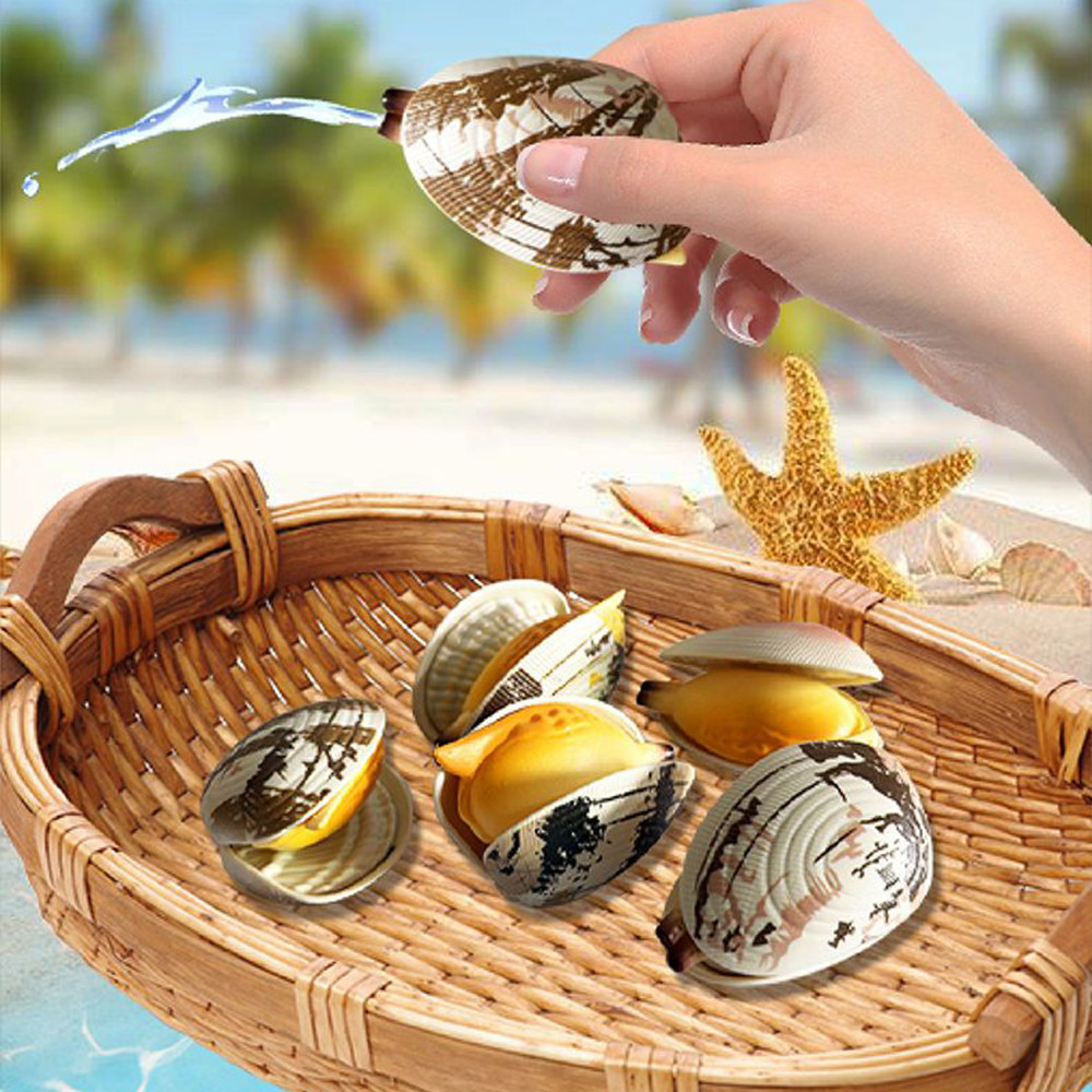 ใหม่สร้างสรรค์หอยรูปสเปรย์น้ําของเล่นเด็กนักเรียนตลกเล่นน้ํา Prank Prop