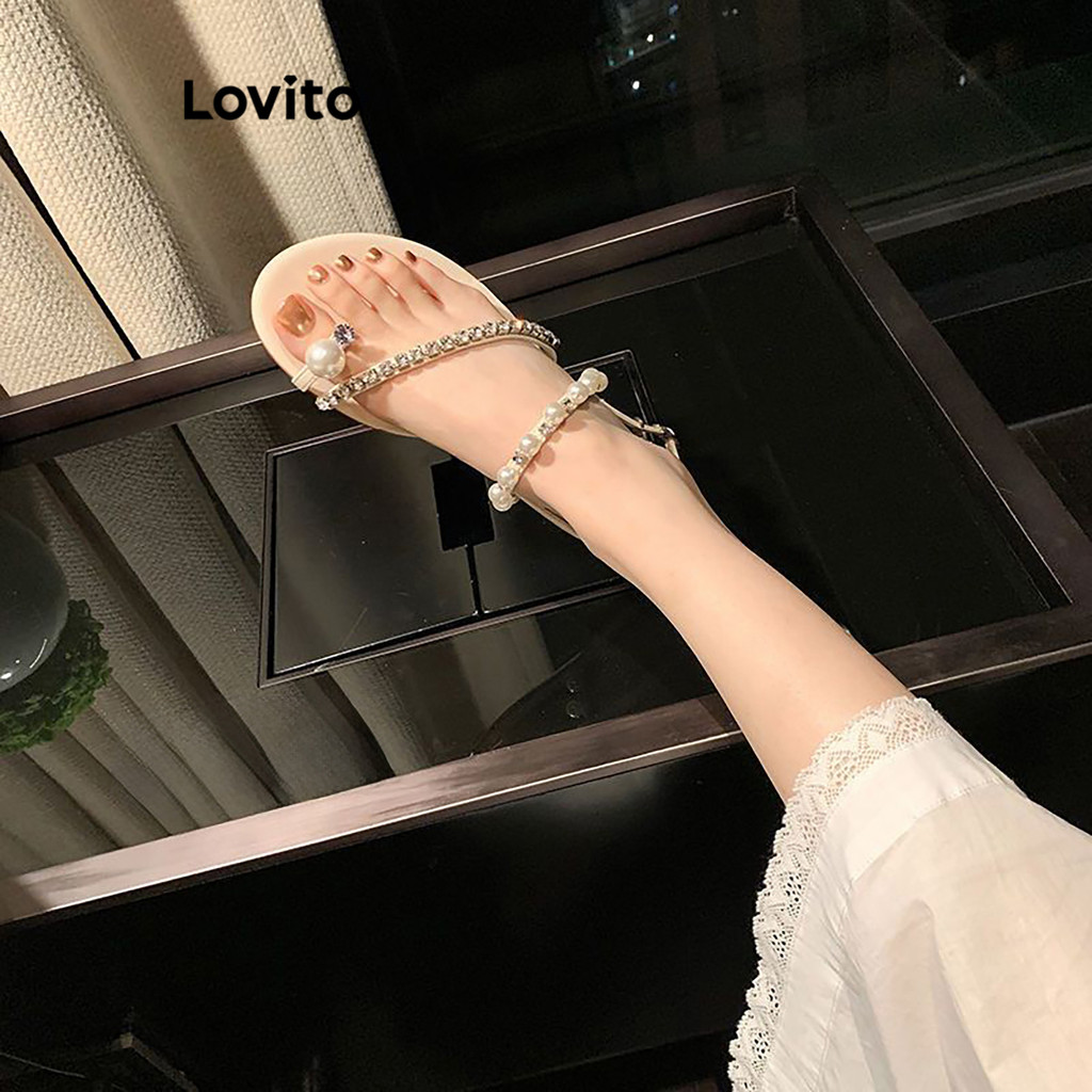 Lovito รองเท้าแตะรัดส้นผู้หญิง พื้นแบน แต่งโซ่ ใส่สบาย สีพื้น สไตล์ลำลอง LFA32428