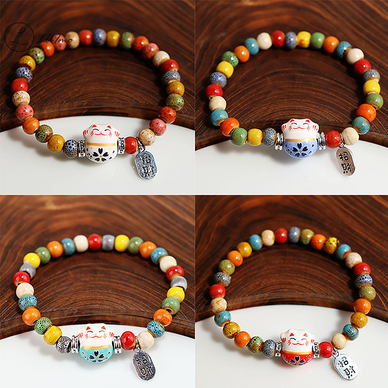 Luimo น่ารัก Lucky Cat สร้อยข้อมือผู้หญิงสาวปรับสีสันสร้อยข้อมือลูกปัดสไตล์จีนเซรามิคแมวจี้สร้อยข้อมือเครื่องประดับใหม่