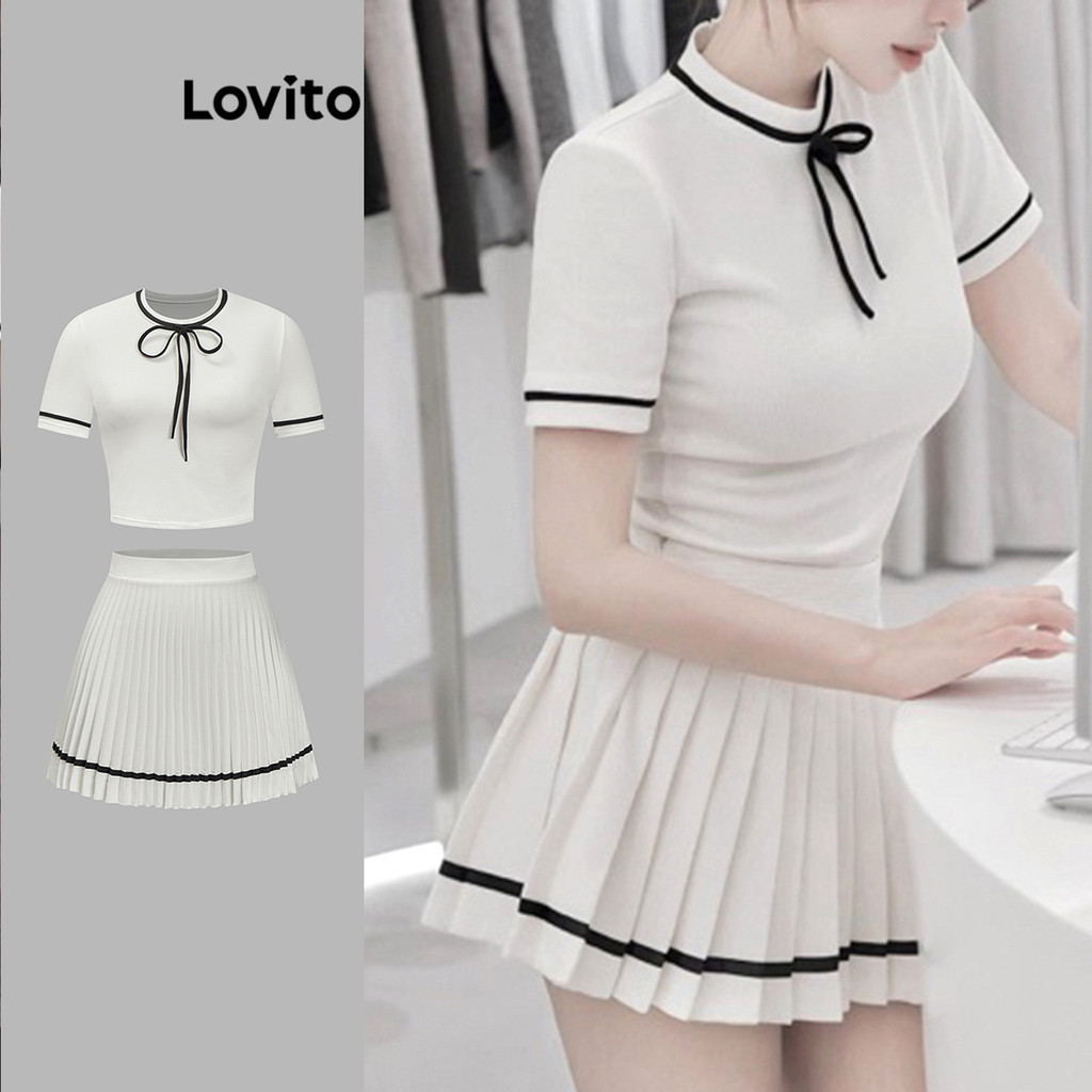 Lovito ชุดเซ็ทกระโปรงผู้หญิง ผูกหน้า แต่งจีบ แต่งขอบสี สีพื้น สไตล์ลำลอง L88AD282