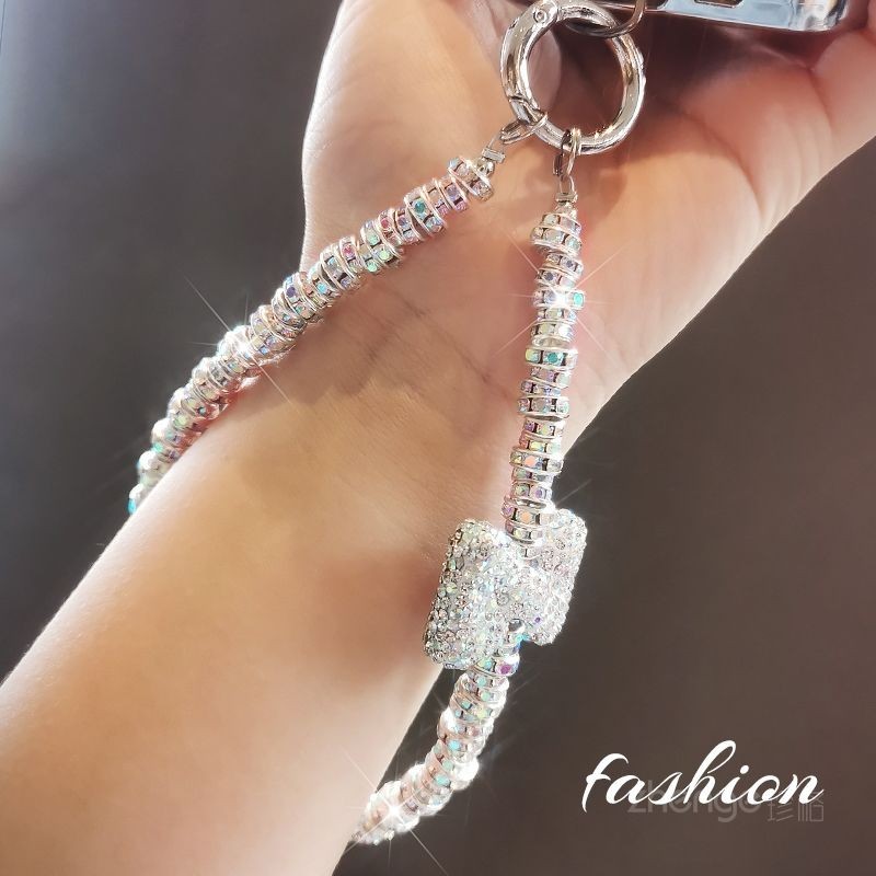 [พีดีเอ็ม] เชือกเส้นเล็กโทรศัพท์มือถือสั้นแฟชั่น พลอยเทียม โบว์ข้อมือแขวนโซ่ระดับไฮเอนด์เทพธิดากระพริบเพชรจี้เชลล์ที่แข็งแกร่งอินเท - รูปที่ 2