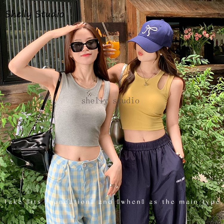 เสื้อกั๊กสลิงสีเหลืองความรู้สึกการออกแบบของผู้หญิงซอกสวมใส่ด้านนอกฐานผิดปกติด้านในด้านบนพร้อมแผ่นหน้าอก