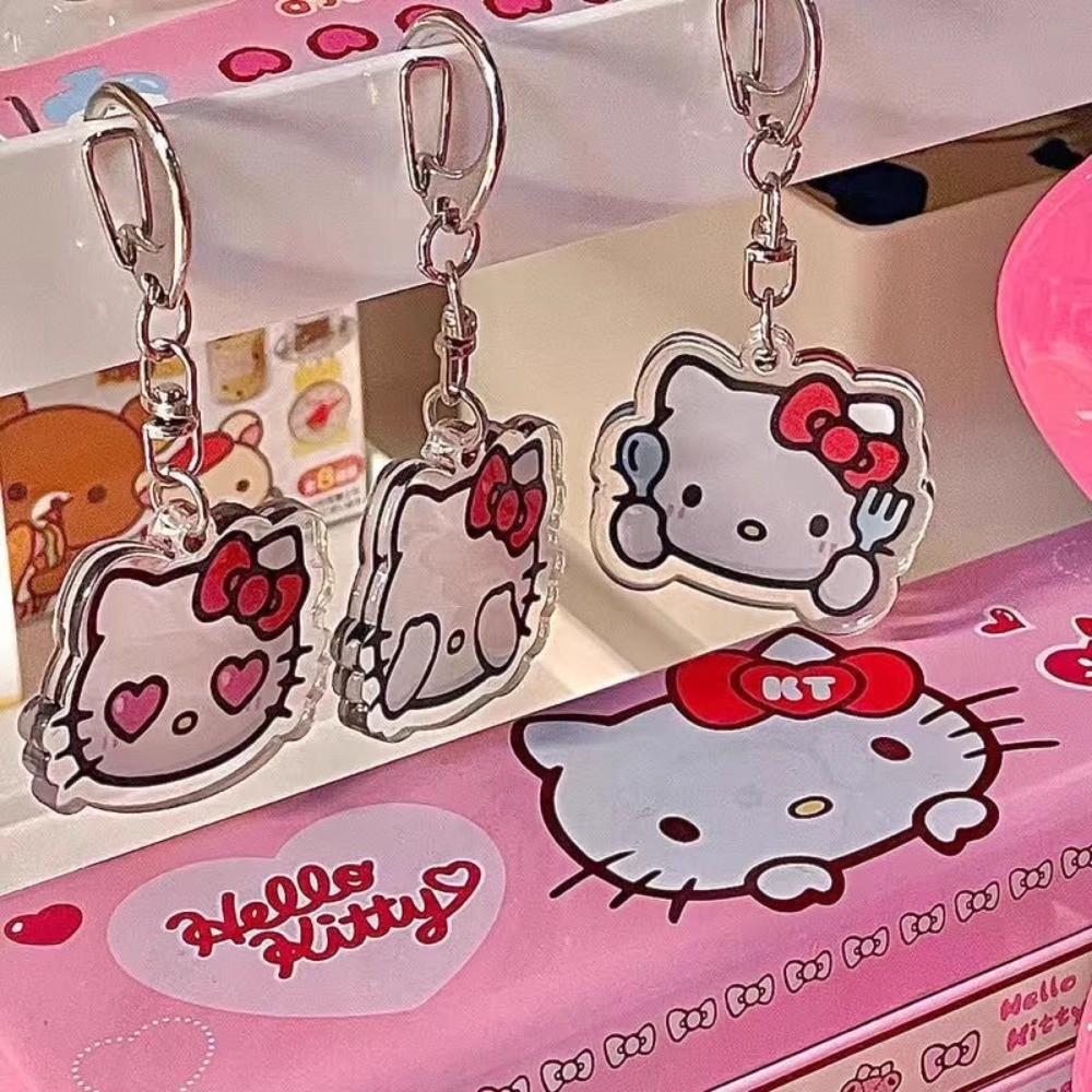 Sanrio Hello Kitty พวงกุญแจอะคริลิคใสสองด้านน่ารักสาวกระเป๋าจี้เครื่องประดับ Ins อุปกรณ์เสริมพวงกุญแจขาตั้งแท็ก