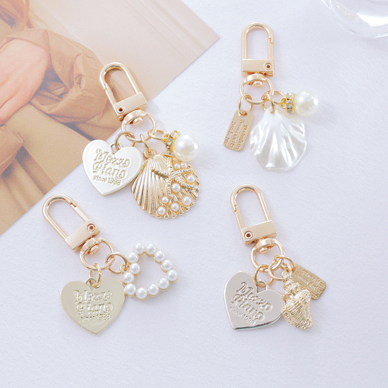 BOGG BAG Dongdong decoration กระเป๋าหลุมพวงกุญแจโลหะจี้น่ารัก อิน กระเป๋าจี้ของขวัญสร้างสรรค์