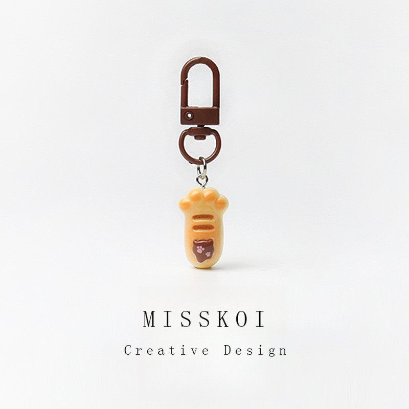 Mjt อาหารของเล่นจําลองน่ารักสนุกแมวกรงเล็บขนมปังพวงกุญแจอาหารจี้กระเป๋าเป้สะพายหลังเครื่องประดับที่ไ