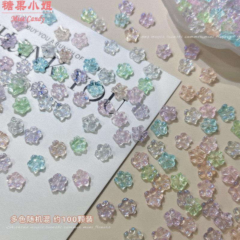 100 ชิ้นน้ําแข็งโปร่งใสดอกไม้ขนาดเล็กอุปกรณ์แต่งเล็บออโรร่าห้ากลีบดอกไม้เรซิ่นอุปกรณ์เสริม