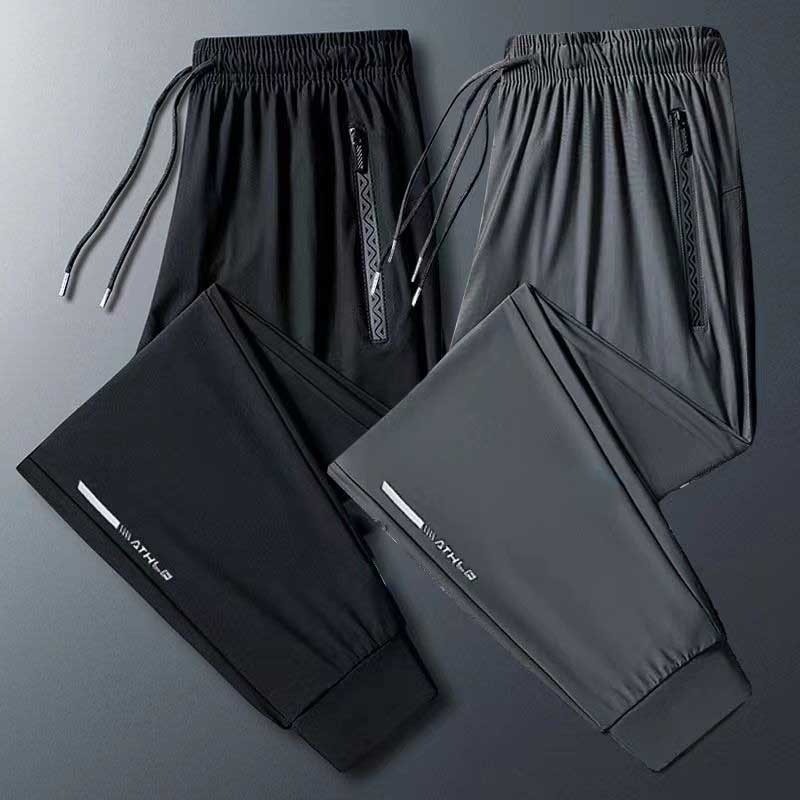 M-5XL กางเกงผ้าไหมน้ำแข็งขาตรงสีพื้นสำหรับผู้ชาย กางเกงจ็อกกิ้งเอวยางยืดทรงหลวมสำหรับฤดูร้อน สีดำ/เทา ไซส์ใหญ่