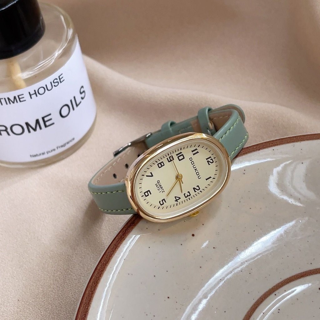 นาฬิการูปไข ่ นักเรียน ins แฟชั ่ นนาฬิกาควอทซ ์ หนังกันน ้ ําทุกการแข ่ งขัน