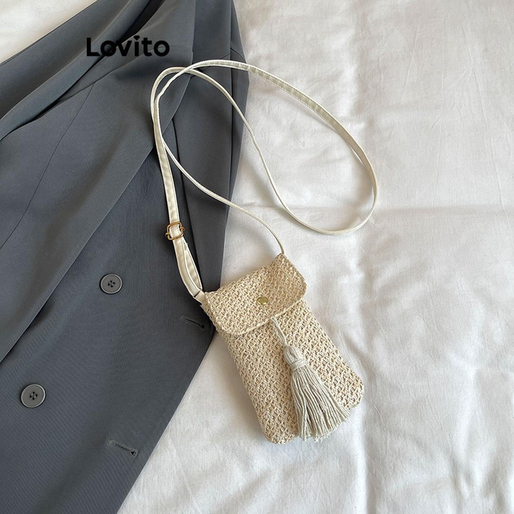 Lovito กระเป๋าโทรศัพท์มือถือวันหยุดธรรมดาแบบลําลองพร้อมกระเป๋าเสน่ห์พู่ฟางสําหรับผู้หญิง  LFA65035