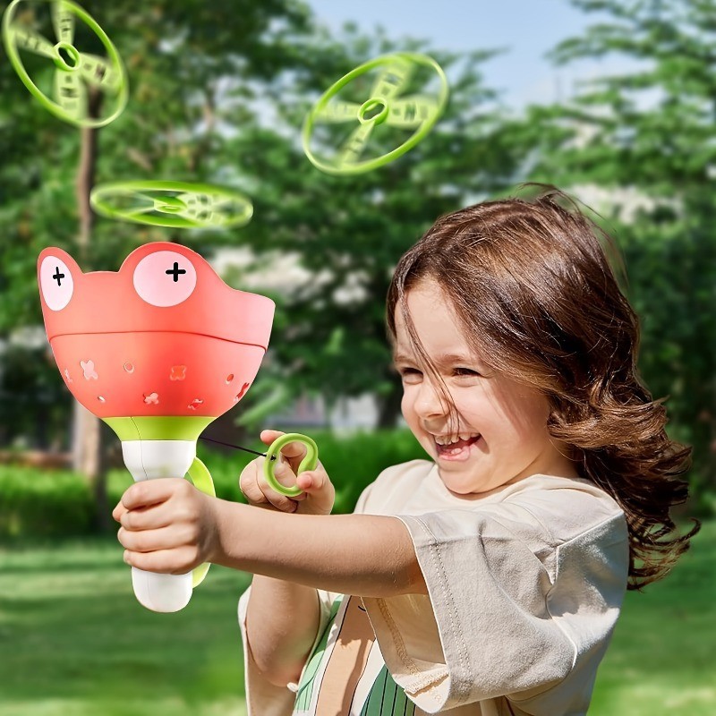 น ่ ารัก UFO Flying Disc ของเล ่ นชุดเกมสีสันและทนทาน Disc Launcher สําหรับเกมกลางแจ ้ งในร ่ มของขวัญปาร ์ ตี ้ สําหรับชายหญิง