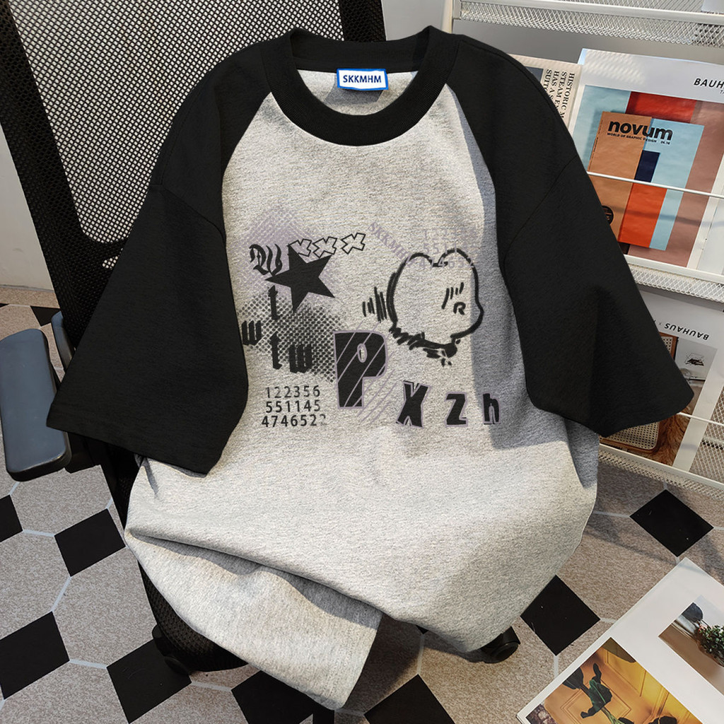 ฤดูร้อนใหม่อเมริกันย้อนยุคพิมพ์ตัดกันแขนสั้นเสื้อยืดผู้ชายหรือผู้หญิงอินเทรนด์แบรนด์หลวมครึ่งแขนด้านบน