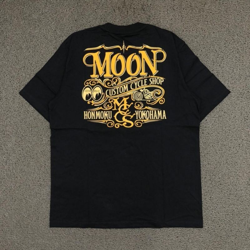 พร้อมสต็อก MOONEYES เสื้อยืดพิมพ์ลายตาฤดูร้อนสไตล์ใหม่ผ้าฝ้ายแท้ทุกการแข่งขันผู้ชายผู้หญิงเสื้อแขนสั้น
