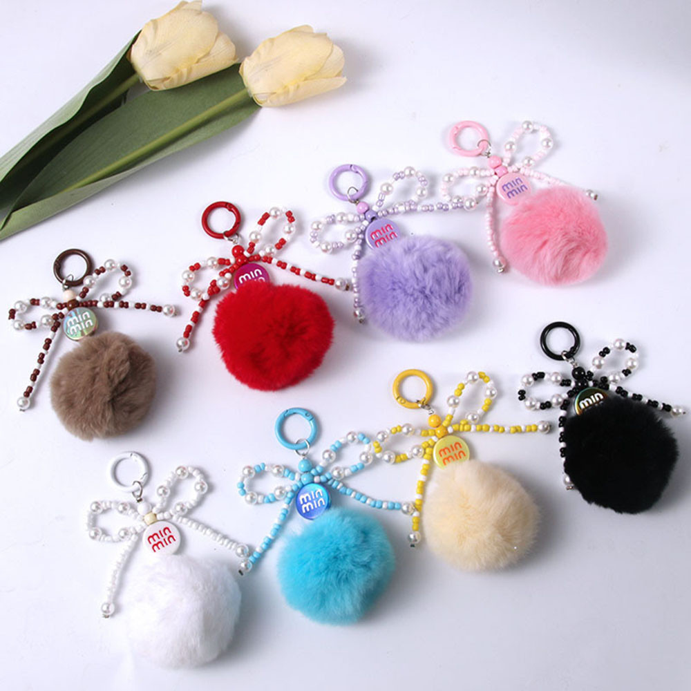 ตุ๊กตาพวงกุญแจกระเป๋าจี้ Anti-lose พวงกุญแจ Bowknot Hairballs หูฟังโบว์ Hairball สายคล้องโทรศัพท์ของขวัญน่ารักทําด้วยมือ DIY Key Chain