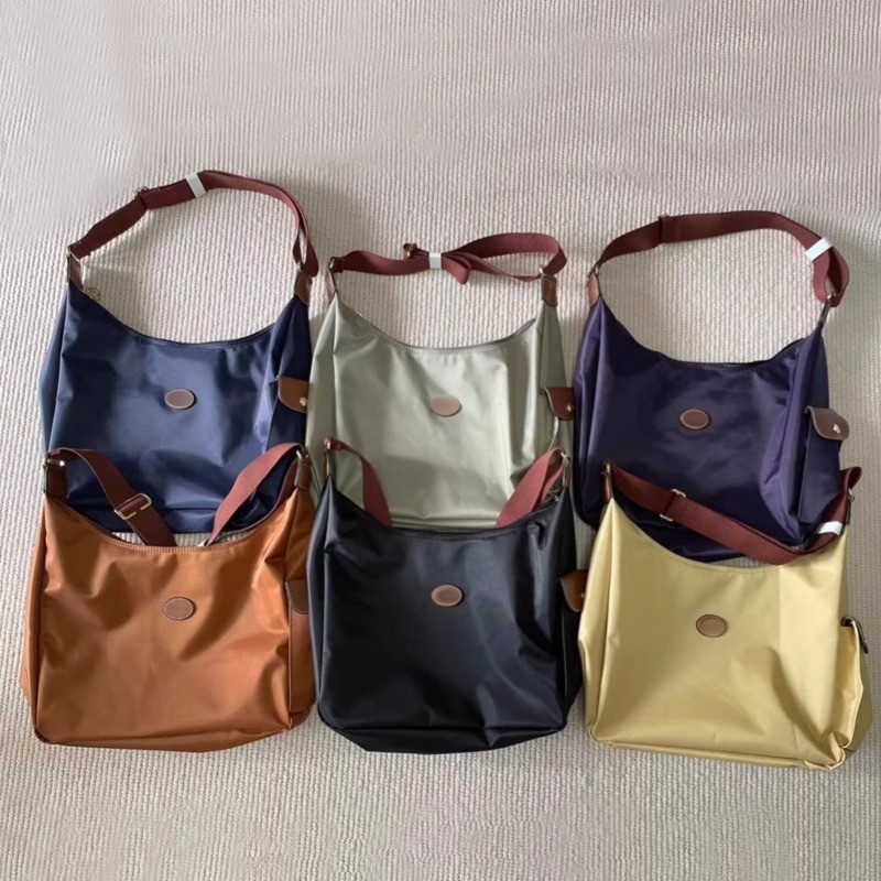 2025 สไตล์ใหม่ Commuter หญิงกระเป๋า hobo ไนลอน Crossbody กระเป๋าหญิง Retro Messenger กระเป๋าสะพายขนาดใหญ่ความจุกระเป๋าแม่เด็ก Dumpling กระเป๋า