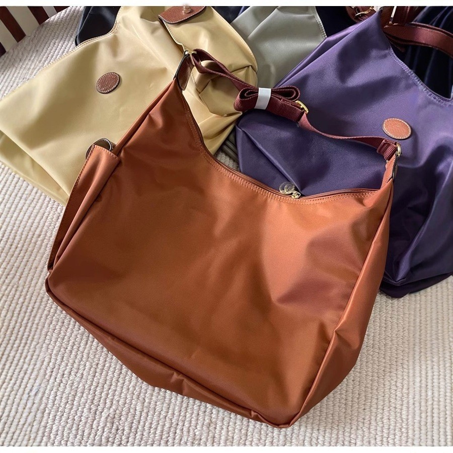 2025 สไตล์ใหม่ Commuter หญิงกระเป๋า hobo ไนลอน Crossbody กระเป๋าหญิง Retro Messenger กระเป๋าสะพายขนาดใหญ่ความจุกระเป๋าแม่เด็ก Dumpling กระเป๋า