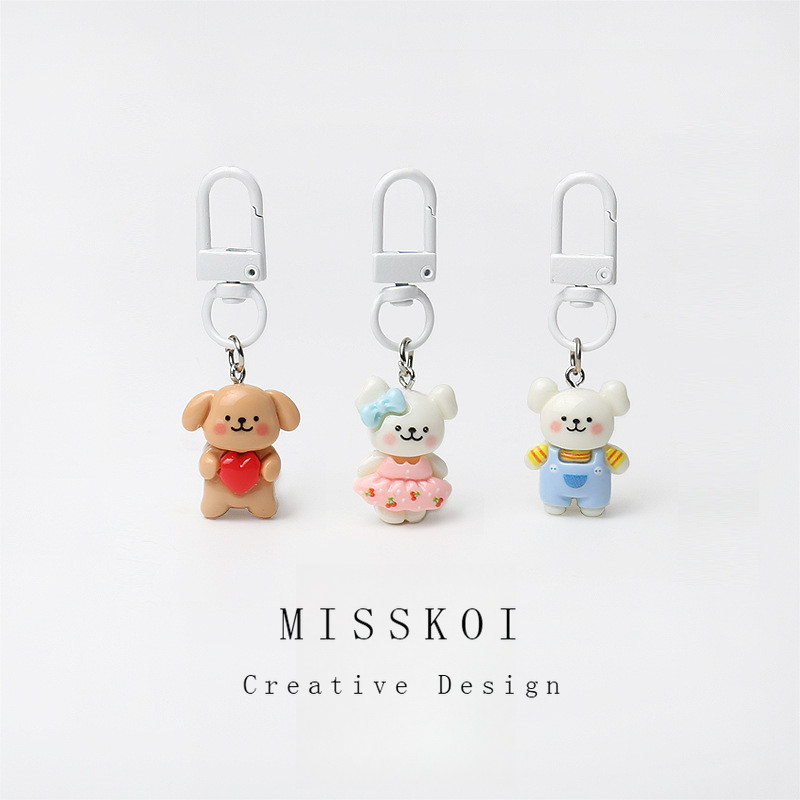 MISSKOI ins ขายร้อนคู่สายลูกสุนัขน่ารักกระเป๋านักเรียนพวงกุญแจสร้างสรรค์