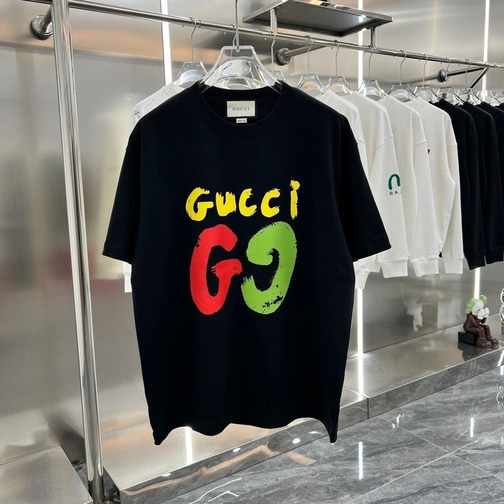 สไตล์ใหม่จดหมายพิมพ์รอบคอผ้าฝ้ายแท้แขนสั้นเสื้อยืดผู้ชายผู้หญิงสไตล์เดียวกันหลวมแฟชั่นแนวโน้ม