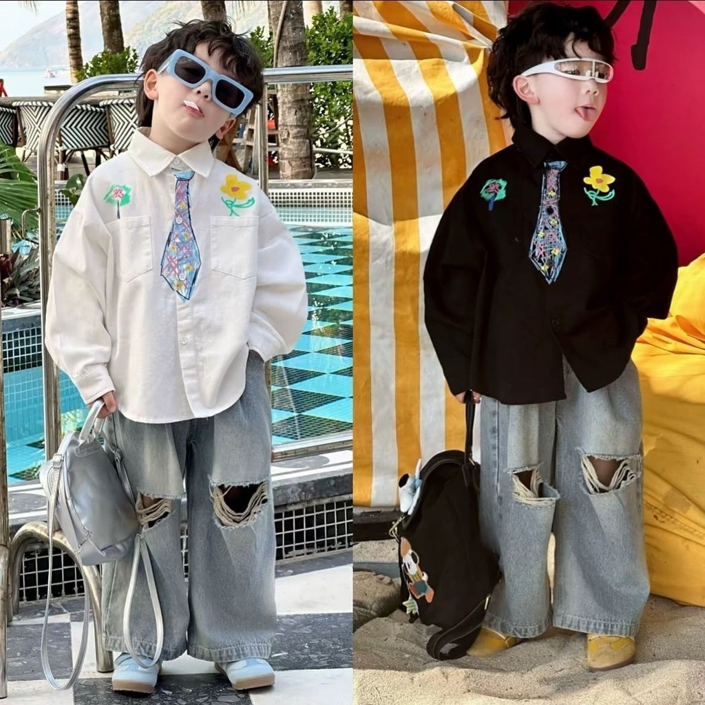 เด็กชายฤดูใบไม้ผลิสไตล์พิมพ์ผูกฉีกกางเกงยีนส์สูทสไตล์ใหม่กราฟฟิตีหลวมพอดีเสื้อสูทสองชิ้น