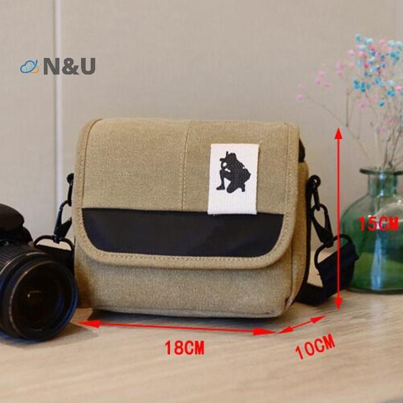 N & U 1PC สําหรับ Canon EOS R100 R10 R50 R7 RP 250D 200D M200 M50 M6 SX70 SX60 Nikon ZFC Z50 Z30 Z5 D3500 B700 B600 P530 P610 กระเป๋ากล้อง DSLR COD