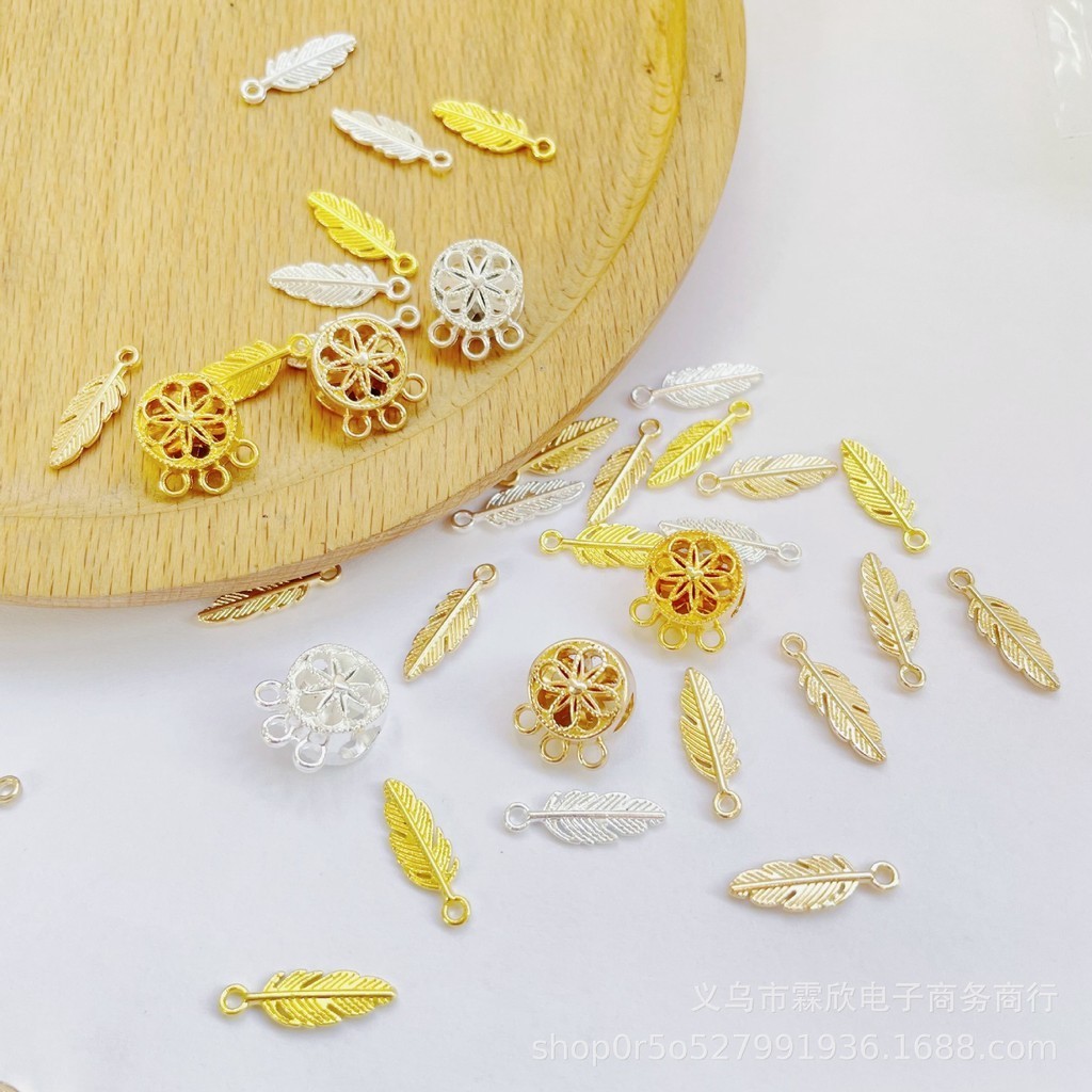 40ชิ้นโลหะผสมขนนกฝันจับสร้อยข้อมือพู่จี้ทําเองสร้อยข้อมือลูกปัดอุปกรณ์เครื่องประดับขายส่ง
