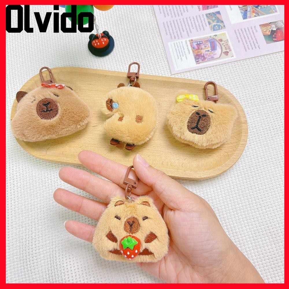 Olvido Capybara ตุ๊กตาพวงกุญแจ,กระเป๋านักเรียนอุปกรณ์เสริมของขวัญ Capybara จี้ตุ๊กตา,การ์ตูนตุ๊กตาของเล่นพวงกุญแจรถ