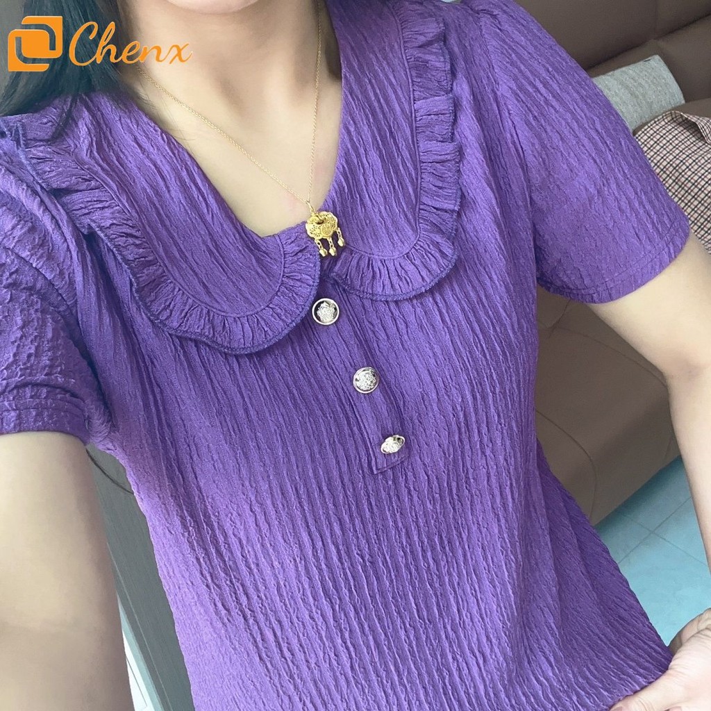 เสื้อสีทึบหญิงโจ๊กเกอร์ใบบัวคอปกแขนสั้น จุดต่ําสุด เสื้อ