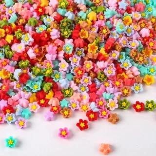 100ชิ้นที่มีสีสันมินิผสมดอกไม้แบนกลับเรซิ่นดอกไม้การ์ตูน ทําเอง เครื่องประดับเสน่ห์หัตถกรรมตกแต่งสาวตกแต่งเล็บ