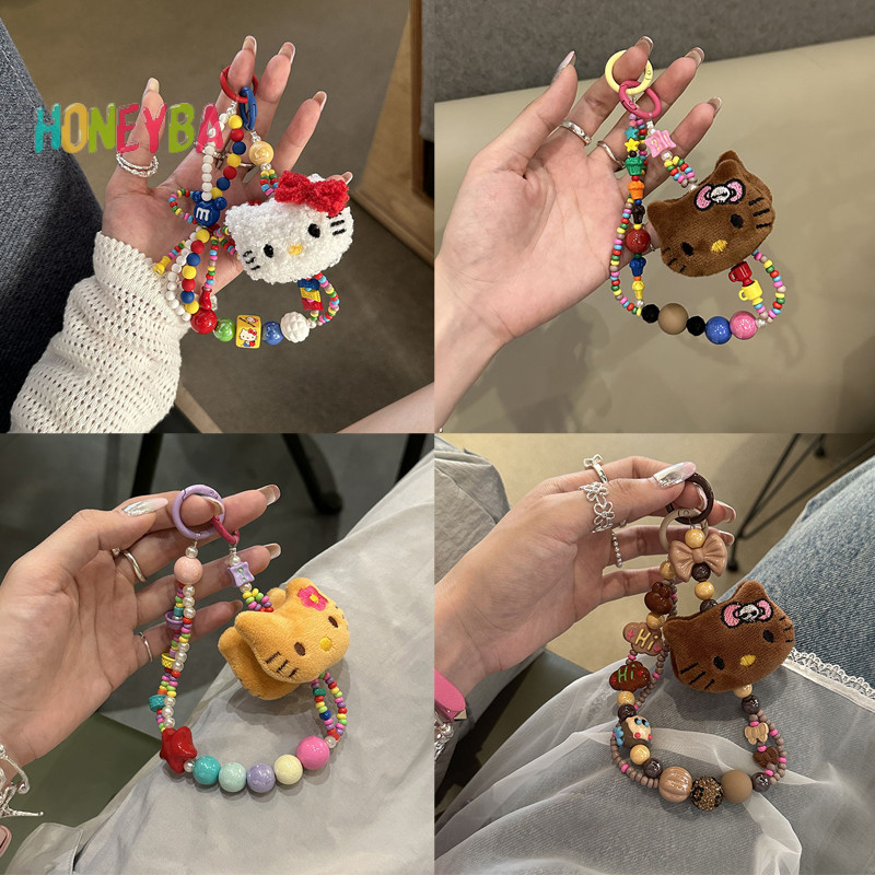 SANRIO <Honeyba>น่ารักSanrio Plushผิวสีดําhello Kittyลูกปัดที่มีสีสันKey Chainเคสโทรศัพท์เชือกเส้นเล็กกระเป๋าจี้น่ารักสาวหัวใจอุปกรณ์เสริมของขวัญNice