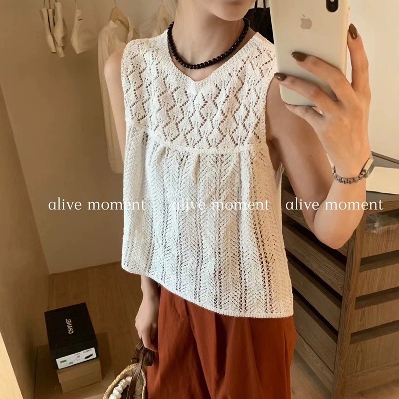 ฤดูร้อนสไตล์ใหม่ออกแบบกลวงเสื้อกันหนาวแขนกุดเสื้อกั๊กผู้หญิงอารมณ์หลวมเสื้อกั๊กด้านในด้านนอกจําฉัน ว้าว