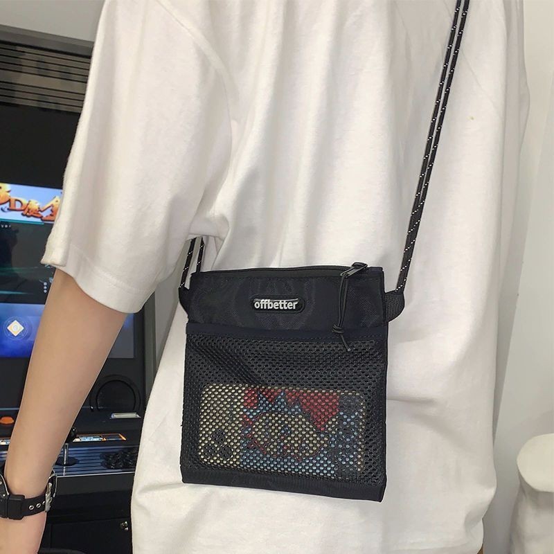 Ins Crossbody แบรนด์แฟชั่นสำหรับผู้ชายญี่ปุ่นแฟชั่นสบาย ๆ กระเป๋าสะพายไหล่สุภาพสตรีเรียบง่ายและสง่างามไนลอนนักเรียนบุคลิกภาพเฉพาะฮ่องกงกระเป๋าสะพายขนาดเล็ก