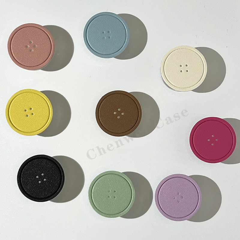 Ins Hot PU หนังปุ ่ มออกแบบที ่ วางโทรศัพท ์ มือถือสําหรับ iPhone Android Clear Airbag Phone Grip