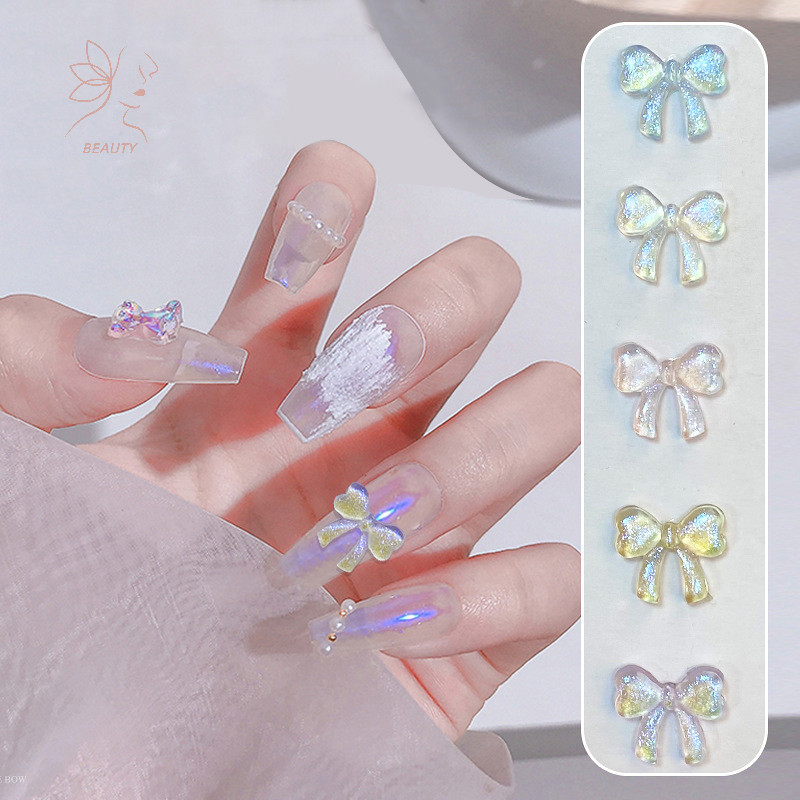 [maybeauty] 20ชิ้น/ถุงใสออโรร่าโบว์อุปกรณ์เพ้นท์เล็บเรซิ่นglitterโบว์ตกแต่งเล็บสาวหัวใจdiyอุปกรณ์แต่งเล็บ {TH}